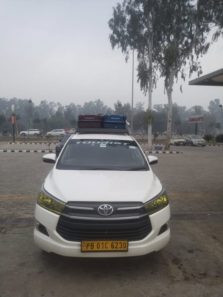 Our own Innova Crysta loaded with luggage for an outstation trip